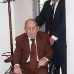 Pastor Voss assists the late Rev. W.O. Kneal into the church.
